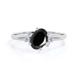 Unique 1.85 Carat Oval Cut Black Diamond and Asymmetrical Engagement Ring in White Gold