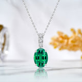 Flawless 1.25 Carat Oval Cut - Emerald - May Birthstone Pendant Necklace for Women in 18K White Gold over Silver
