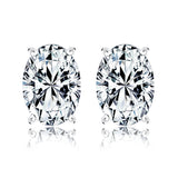 2 Carat Oval Cut Moissanite Solitaire Stud Earrings - 4 Prong - In 18K White Gold Plating Over Silver