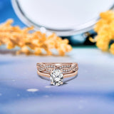 Brillant 1.75 Carat Oval cut Moissanite Engagement Ring and Infinity Wedding Band Set in 18K Rose Gold over Silver