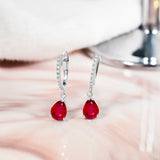 2.25 Carat Pear Brilliant Cut - Ruby - July Birthstone Pave Set Huggie Hoop Earrings - 18K White Gold Plating over Silver