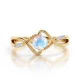 0.55 ct Round Moonstone Twisted Shank Engagement Ring