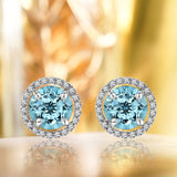 1.25 Carat Round Cut Blue Topaz December Birthstone Halo Stud Earrings in 18K White Gold over Silver