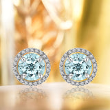 1.25 Carat Round Cut Aquamarine March Birthstone Halo Stud Earrings in 18K White Gold over Silver