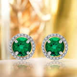 1.25 Carat Round Cut Emerald May Birthstone Halo Stud Earrings in 18K White Gold over Silver