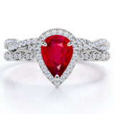 1.5 Carat Pear Cut July Birthstone Ruby and Moissanite Vintage Engagement Ring - Halo Pave Bridal Set in 18K White Gold over Silver