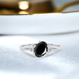 Unique 1.85 Carat Oval Cut Black Diamond and Asymmetrical Engagement Ring in White Gold