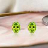 2.5 Carat Oval Cut - Peridot - August Birthstone Solitaire Stud Earrings - 4 Prong - In 18K White Gold Plating Over Silver