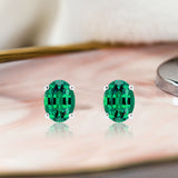 2.5 Carat Oval Cut - Emerald - May Birthstone Solitaire Stud Earrings - 4 Prong - In 18K White Gold Plating Over Silver