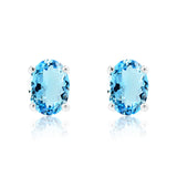 2.5 Carat Oval Cut - Blue Topaz - December Birthstone Solitaire Stud Earrings - 4 Prong - In 18K White Gold Plating Over Silver