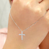 Shared-Prong 0.10 TCW Round Shape Moissanite Pave Style Cross Pendant Necklace in 18K White Gold Plating over Silver