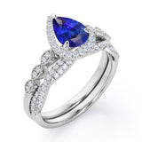 1.5 Carat Pear Cut September Birthstone Blue Sapphire and Moissanite Vintage Engagement Ring - Halo Pave Bridal Set in 18K White Gold over Silver