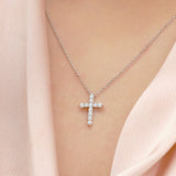 Shared-Prong 0.10 TCW Round Shape Moissanite Pave Style Cross Pendant Necklace in 18K White Gold Plating over Silver