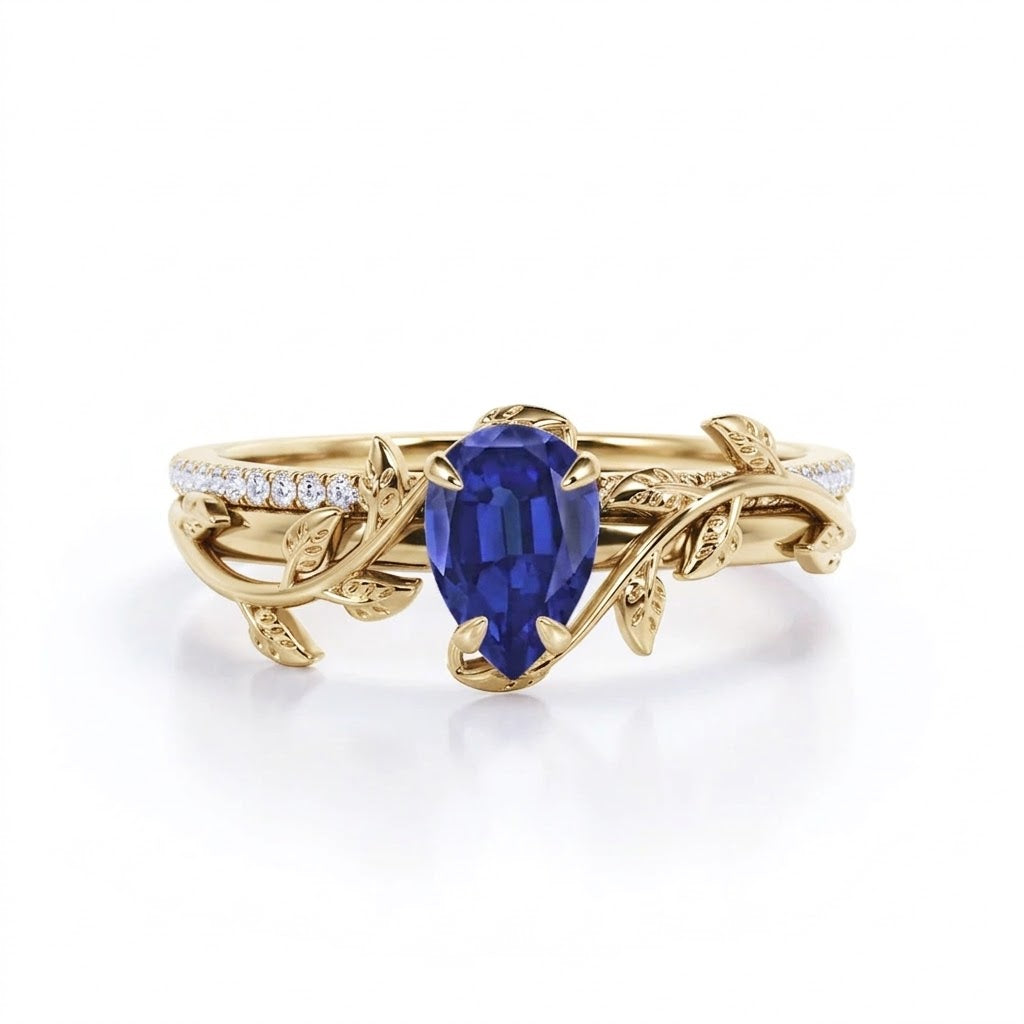 1.25 Ct Pear Cut Lab Sapphire Floral Bridal Set