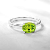 1.25 Carat Oval Cut Peridot SWAROVSKI - August Birthstone Solitaire Engagement Ring in 18k White Gold Over Silver