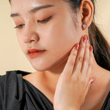 Certified Half Carat TCW Round Cut Certified Lab Diamond Petite Twist Stud Earrings in 18k White Gold over Silver