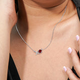 Modern 1.25 TCW Round Cut - Garnet - January Birthstone Floating XO Pendant Necklace in 18K White Gold over Silver