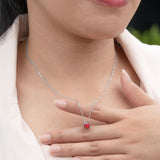1 Carat Round Cut Lab-Created Ruby Solitaire Pendant Necklace in 18k White Gold Over Silver