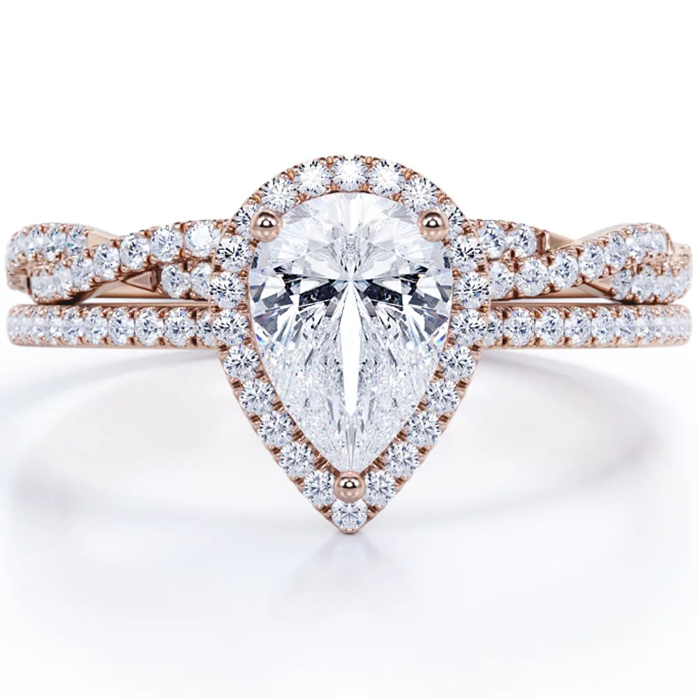 1.25 Carat pear cut Moissanite and Diamond Halo Wedding Ring Set in White Gold