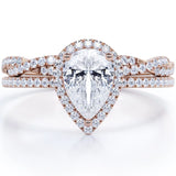 1.25 Carat pear cut Moissanite and Diamond Halo Wedding Ring Set in White Gold