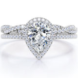 1.25 Carat pear cut Moissanite and Diamond Halo Wedding Ring Set in White Gold