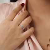 Cathedral Prong 1.25 Carat Round Shaped Moissanite Half Pave Infinity Twisted Shank Engagement Ring In 18K White Gold Plating Over Silver