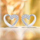 Beautiful Heart-Shaped Semi Pave Stud Earrings in 18k White Gold over Silver