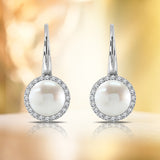 Beautiful Halo Round Pearl Dangling Earrings in 18k White Gold over Silver