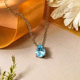 Elegant 1.5 TCW Pear Shaped - Aquamarine - March Birthstone Prongs Solitaire Slider Pendant Necklace in 18K White Gold over Silver