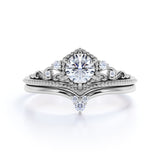 Four Prong 1.25 Carat Round Cut Moissanite Bridal Set