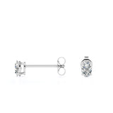 0.20 Carat Ovate Certified Lab Diamond - 4 Prong Solitaire Stud Earrings - 18K White Gold Plating Over Silver