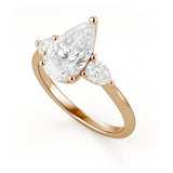 1.10 Ct Pear Moissanite Three-Stone Engagement Ring