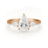 1.10 Ct Pear Moissanite Three-Stone Engagement Ring