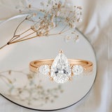 1.10 Ct Pear Moissanite Three-Stone Engagement Ring