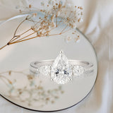 1.10 Ct Pear Moissanite Three-Stone Engagement Ring