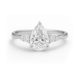 1.10 Ct Pear Moissanite Tapered Side Stone Engagement Ring