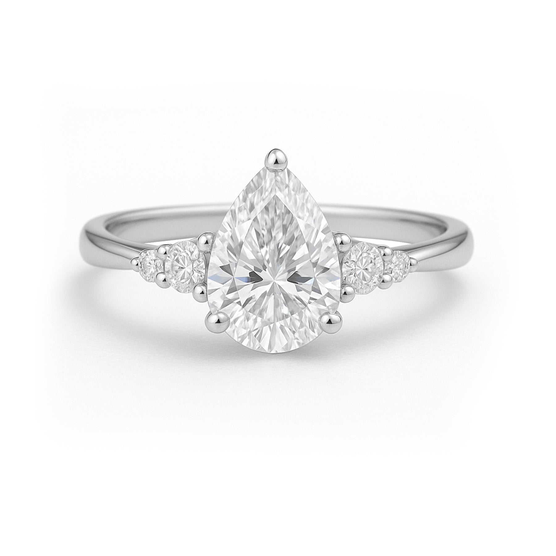 1.10 Ct Pear Moissanite Tapered Side Stone Engagement Ring