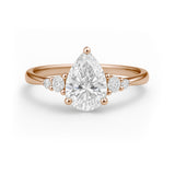 1.10 Ct Pear Moissanite Tapered Side Stone Engagement Ring