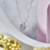 Floating 1 ct Heart Shaped Bezel Cut Slider Moissanite Pendant Necklace in 18K White Gold over Silver