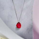 Elegant 1.5 TCW Pear Shaped - Ruby - July Birthstone Prongs Solitaire Slider Pendant Necklace in 18K White Gold over Silver