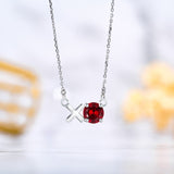 Modern 1.25 TCW Round Cut - Garnet - January Birthstone Floating XO Pendant Necklace in 18K White Gold over Silver