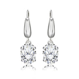 Elegant 2 Carat Oval Cut Moissanite Dangle Earrings in 18K White Gold over Silver