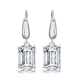 3 Carat Emerald Cut Moissanite Dangle Earrings for Women in 18K White Gold over Silver