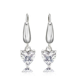 Enchanting 1.5 Carat Heart Shaped Moissanite Dangle Earrings in 18K White Gold over Silver
