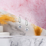 Enchanting 1.5 Carat Heart Shaped Moissanite Dangle Earrings in 18K White Gold over Silver