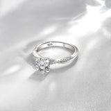 Cathedral Prong 1.25 Carat Round Shaped Moissanite Half Pave Infinity Twisted Shank Engagement Ring In 18K White Gold Plating Over Silver