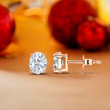 Certified 4 Prong 0.5 Carat Oval Cut Moissanite Solitaire Stud Earrings In 18K Rose Gold Plating Over Silver