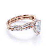 1.25 Carat pear cut Moissanite and Diamond Halo Wedding Ring Set in White Gold