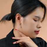 Elegant 2 Carat Oval Cut Moissanite Dangle Earrings in 18K White Gold over Silver