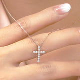 Shared-Prong 0.10 TCW Round Shape Moissanite Pave Style Cross Pendant Necklace in 18K White Gold Plating over Silver